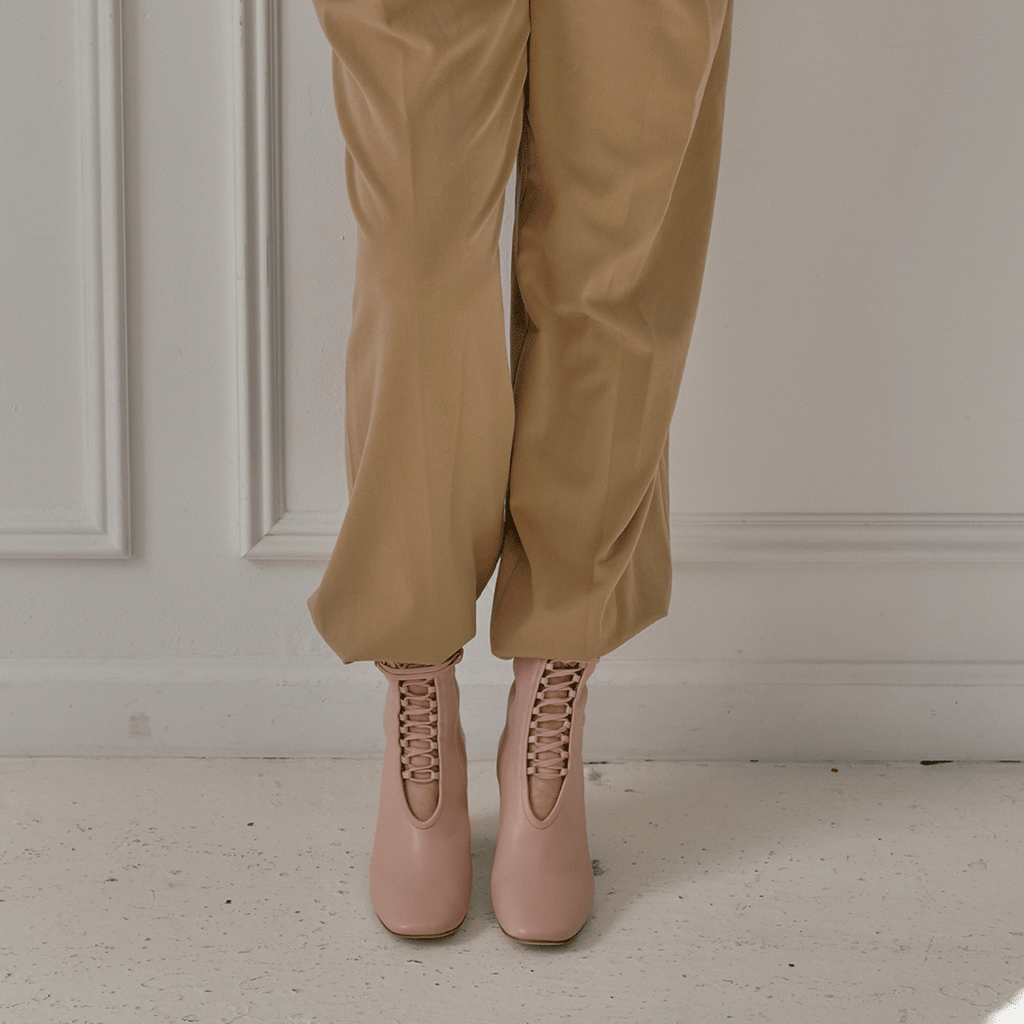 Daniella Shevel Belladonna Lace up boot in Pink with brown pants
