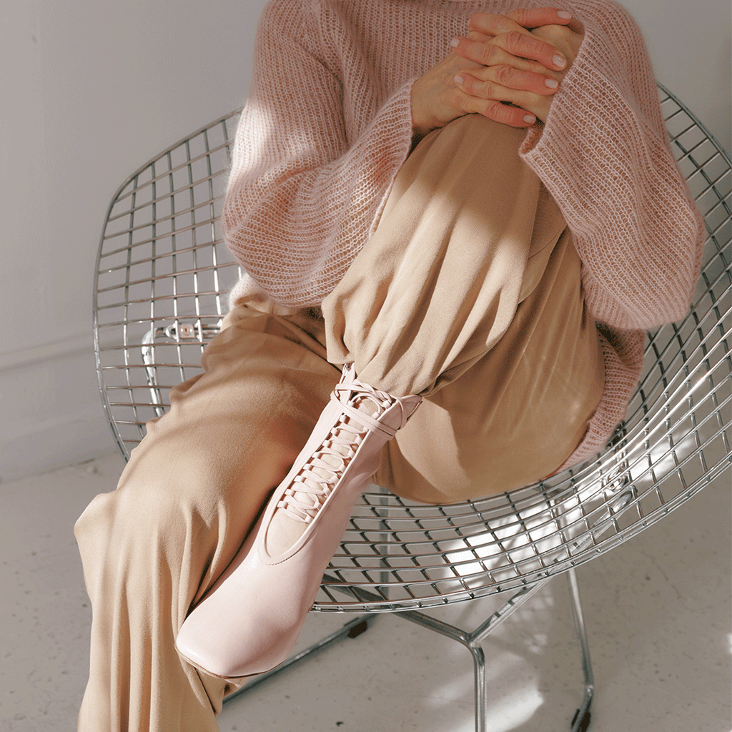 Daniella Shevel Belladonna Lace up boot in Pink with brown pants and pink sweater