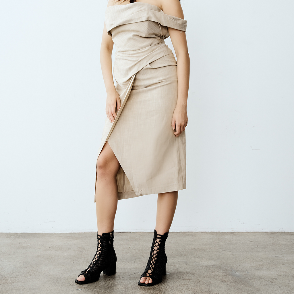 Daniella Shevel designer bootie in black with canvas dress off the shoulder