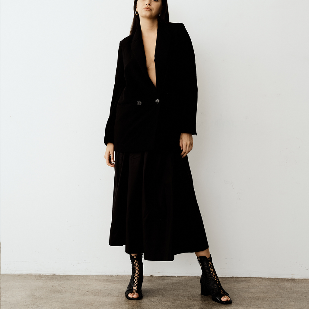Daniella Shevel designer bootie in black with work suit