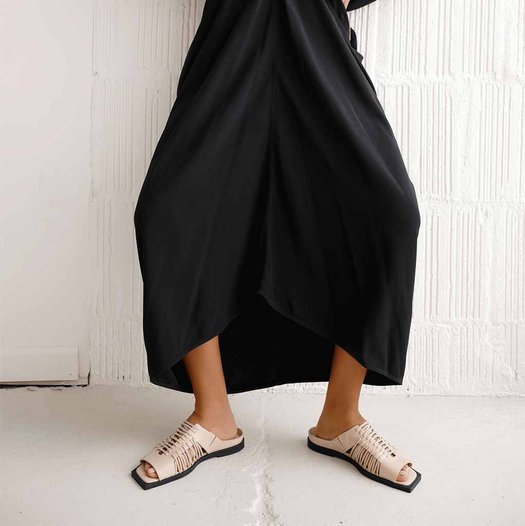Daniella Shevel Gia slide in stone white inside view in black midi dress