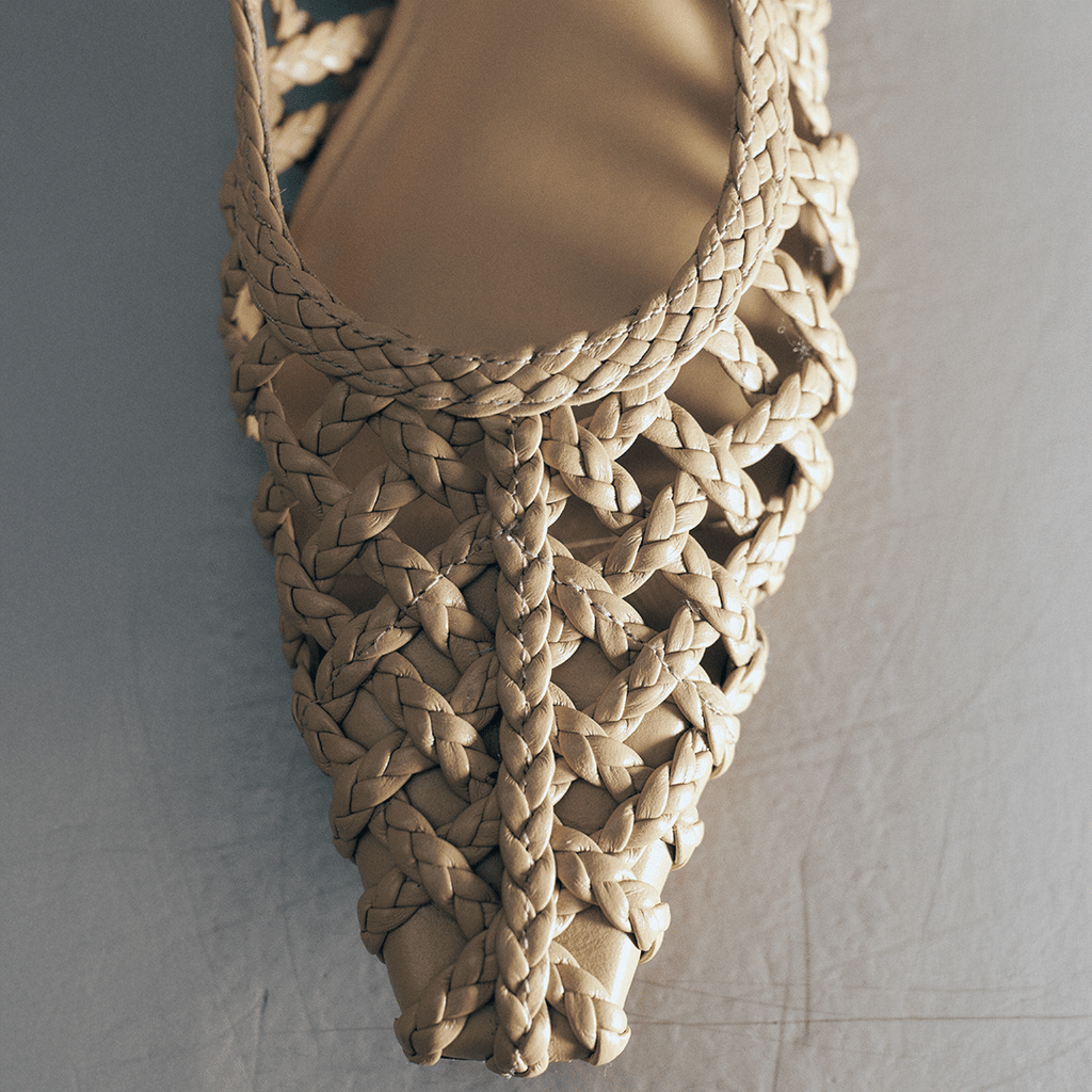 Close-up of pointed toe on Halo Soft Oat flats – featuring artisanal braided weave and neutral woven leather texture.