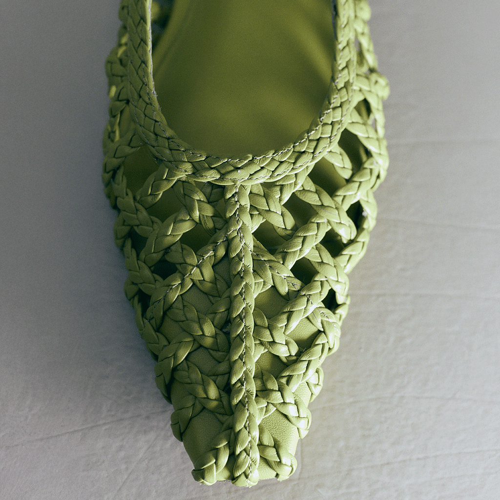 Top-down close-up of the Halo flat toe in Wild Moss – showcasing the handwoven craftsmanship and sleek silhouette.