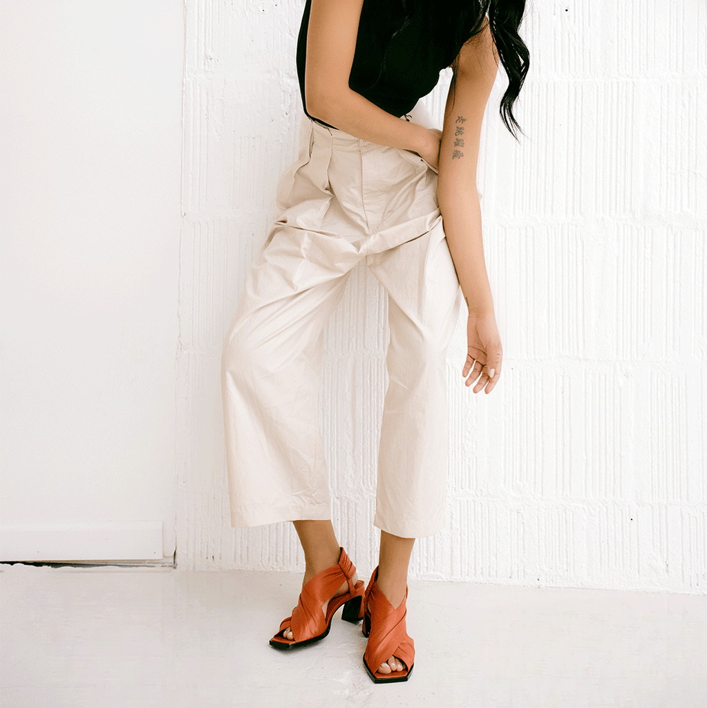 Daniella Shevel Harper lobster red wrap leather sandal with square toe styled in linen pants