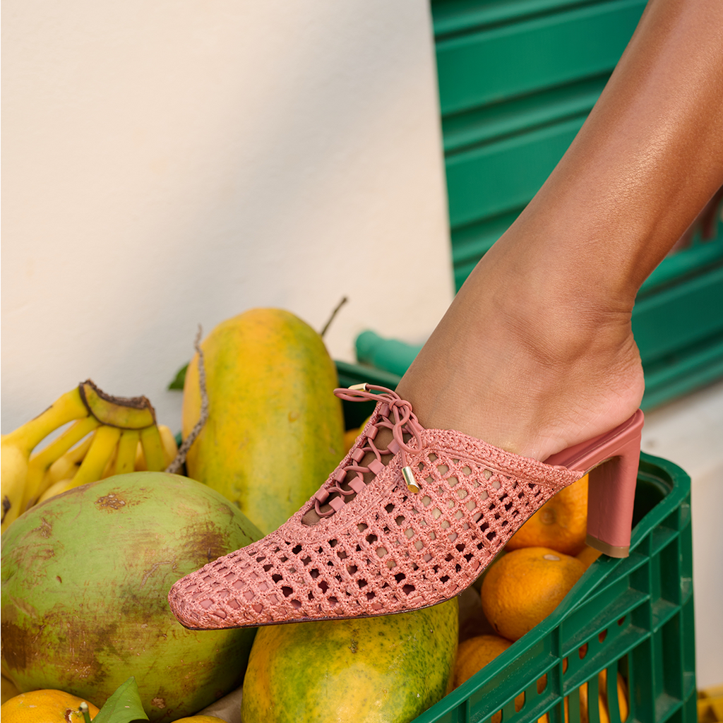  Bruna mule in Berry Petal by Daniella Sheve styled upright for a tonal showcase.

