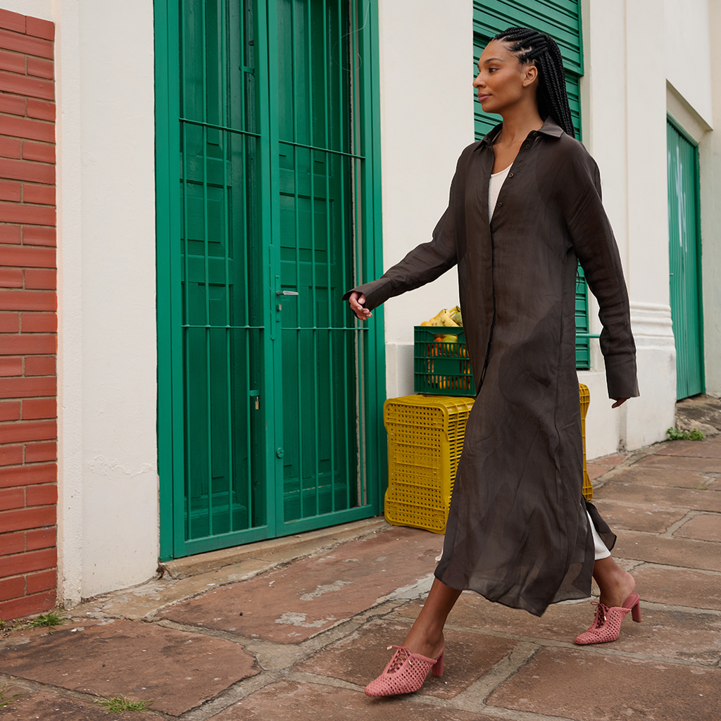 Bruna raffia heels in Berry Petal by Daniella Shevel, styled with a long dark dress for a breezy and sophisticated look.