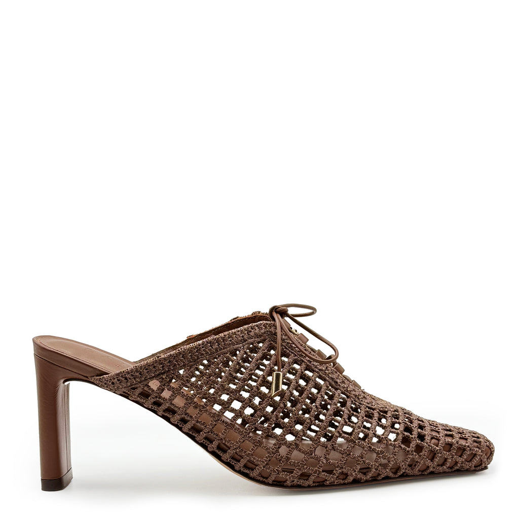 Studio side view of the Daniella Shevel Bruna lace-up mule in Chestnut, featuring a sculpted high heel and handwoven raffia upper in rich chocolate brown.