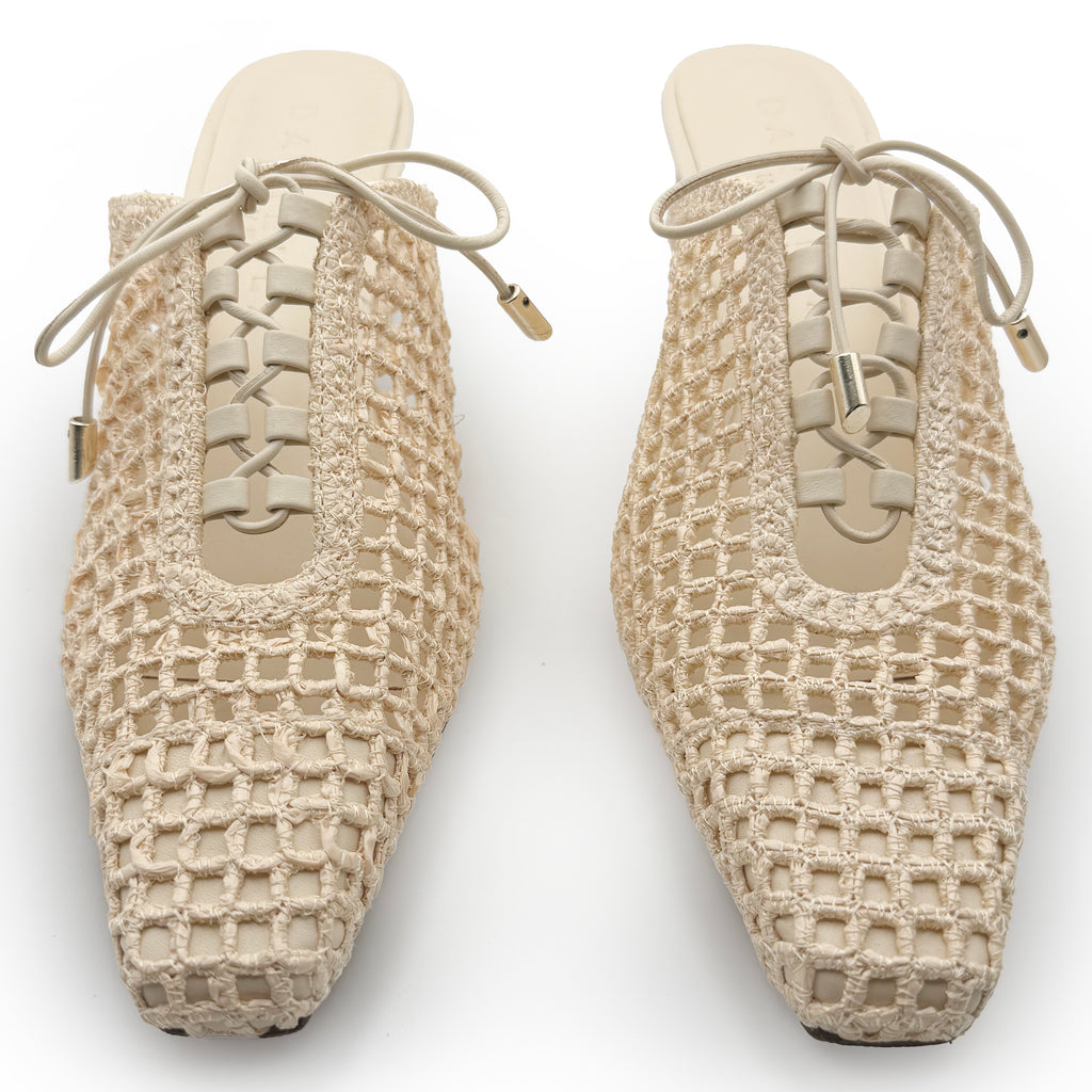 Top-down studio view of Daniella Shevel Lina Mules in Wild Straw – symmetrical lace-up design with pointed woven front and sculpted mid heels.