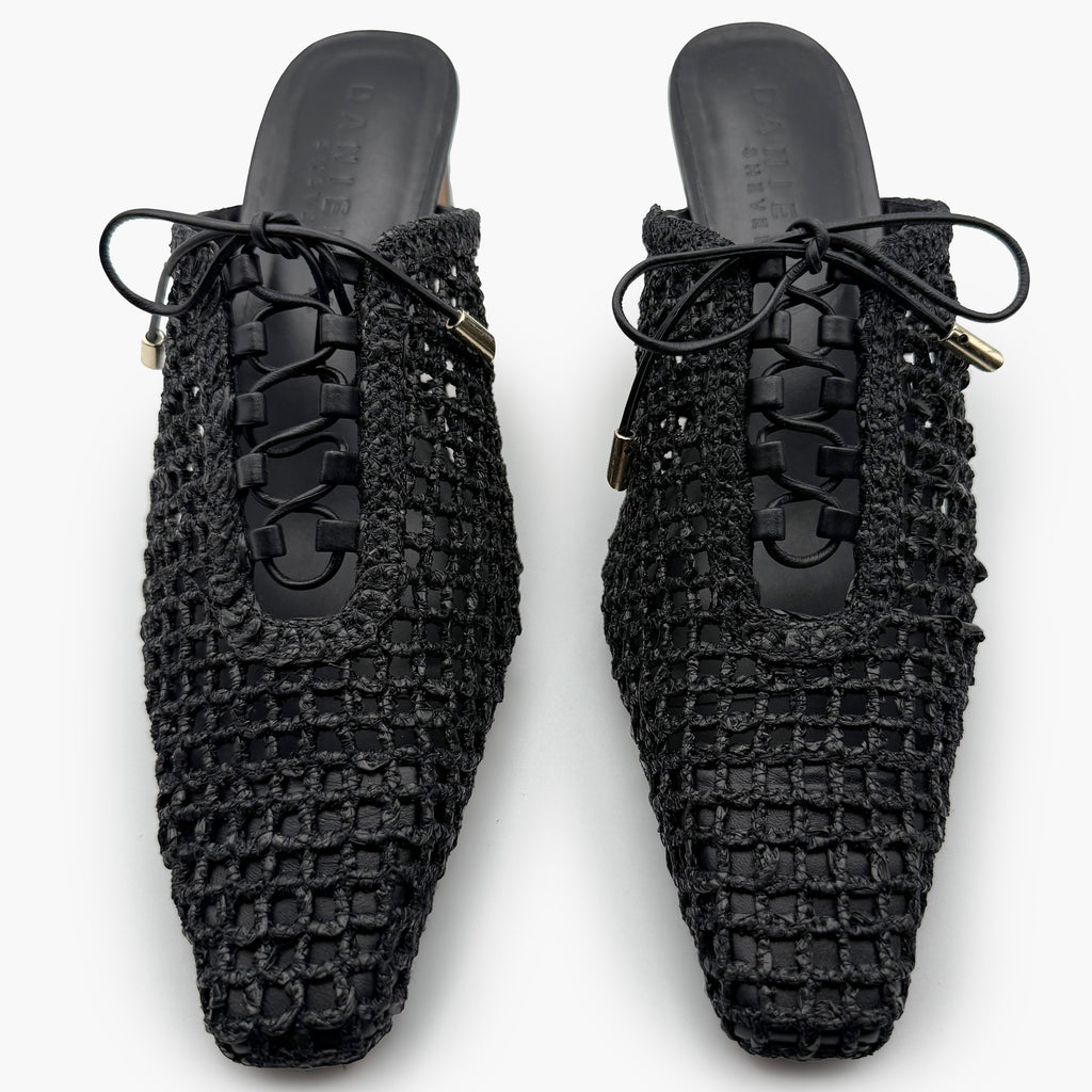 Top-down studio image of Daniella Shevel Lace-Up Raffia Heel Mules – clean view of lace-up design, pointed toe, and symmetrical woven construction.
