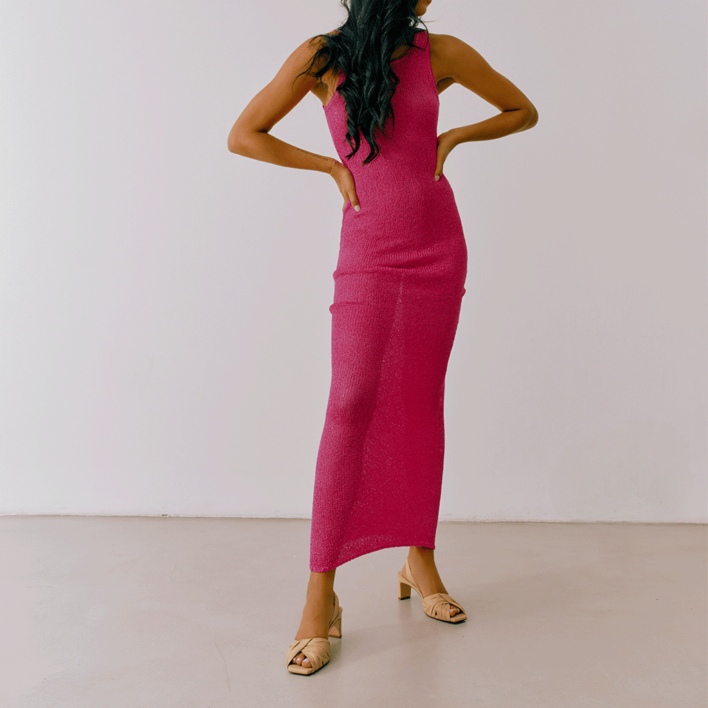 Model styling Riley soft oat sandals with sleeveless pink dress.