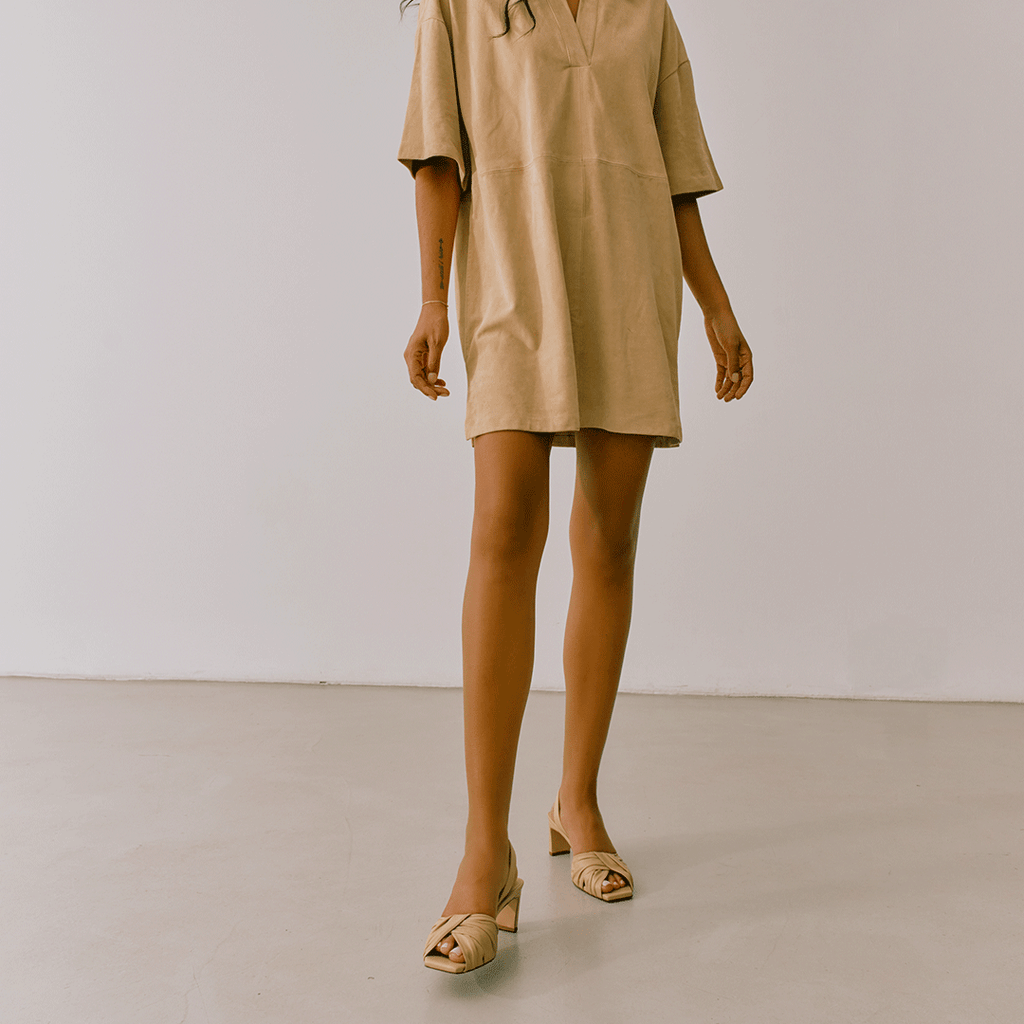 Riley Leather Low-Heel in soft oat styled with tailored dress.