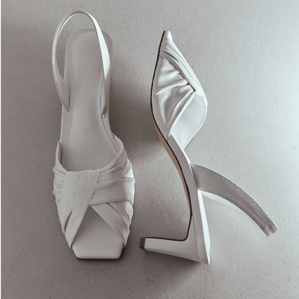 Top view of Riley Leather Low-Heel in white, capturing pleated strap design.