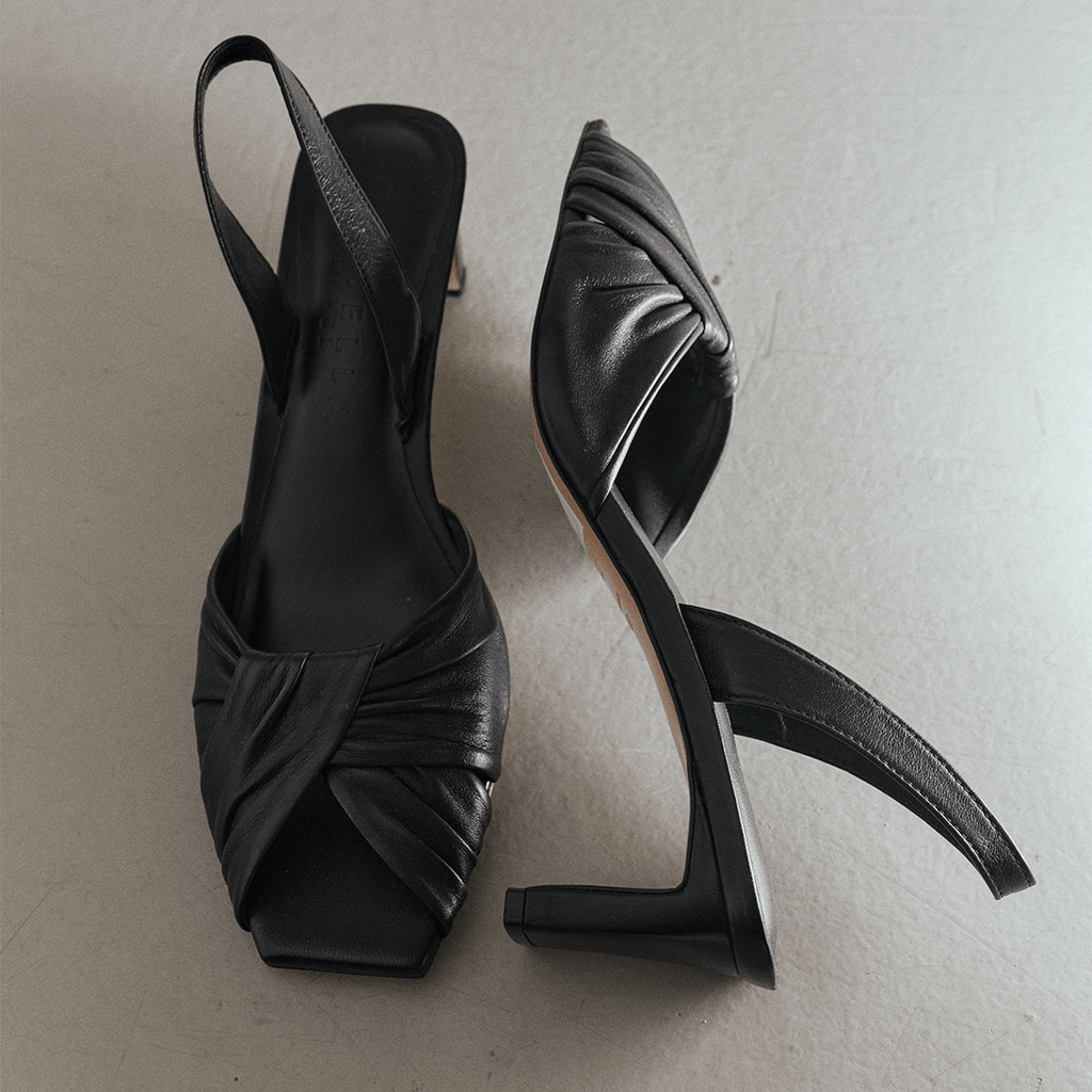 Flat-lay pair shot of Riley Leather Low-Heel in black leather.