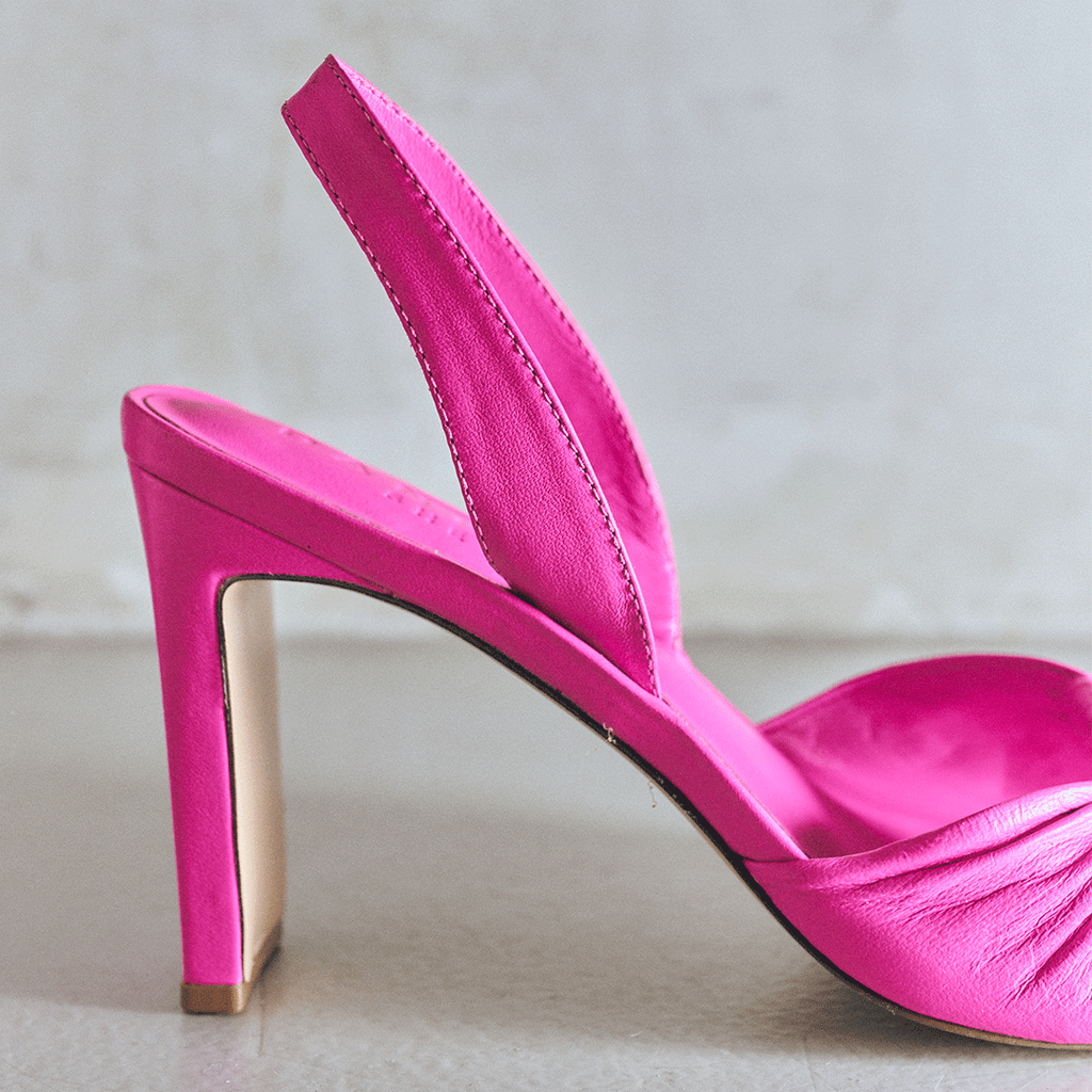 Studio angled view of Skyler slingback in intense pink leather.