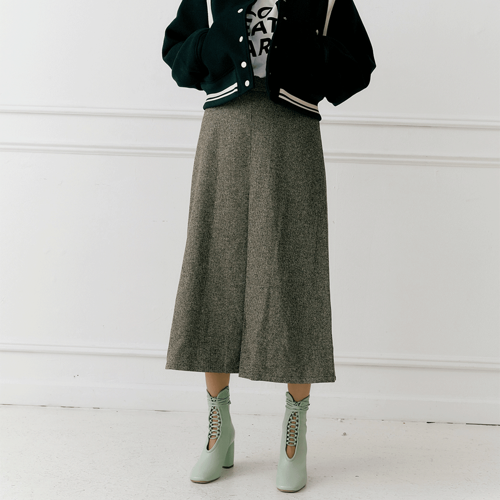 Daniella Shevel Belladonna Mint Green Lace Up Boot styled in bomber jacket and midi skirt