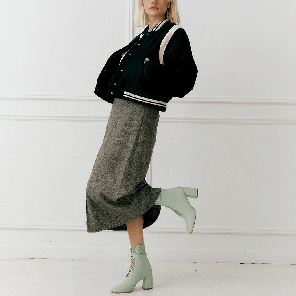Daniella Shevel Belladonna Mint Green Lace Up Boot styled in bomber jacket and midi skirt