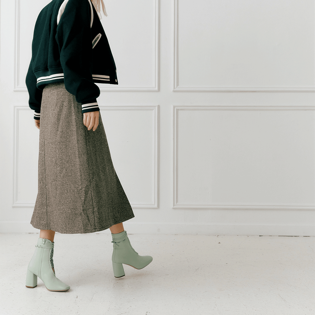 Daniella Shevel Belladonna Mint Green Lace Up Boot styled in bomber jacket and midi skirt