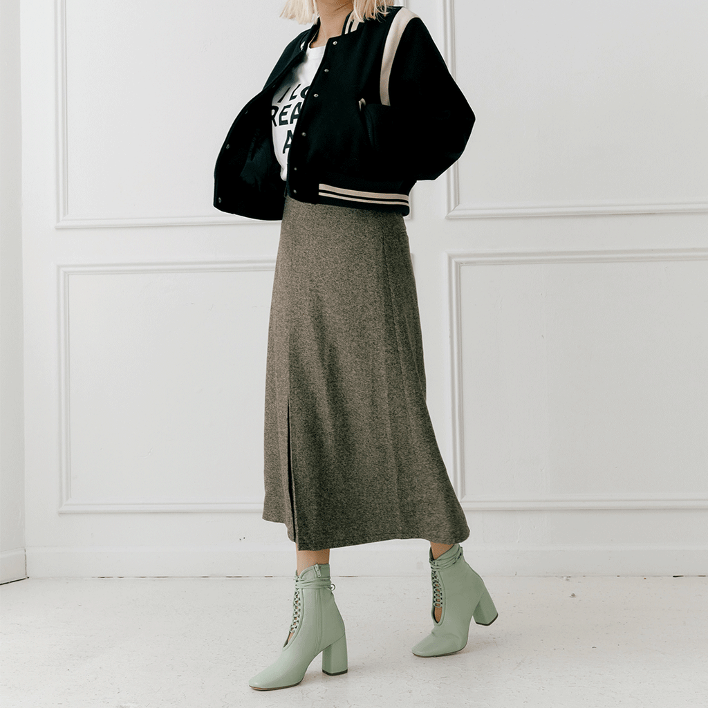 Daniella Shevel Belladonna Mint Green Lace Up Boot styled in bomber jacket and midi skirt