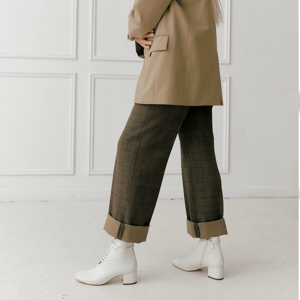 Daniella Shevel Cleo Lace Up Bootie in White with Brown Pants and Blazer