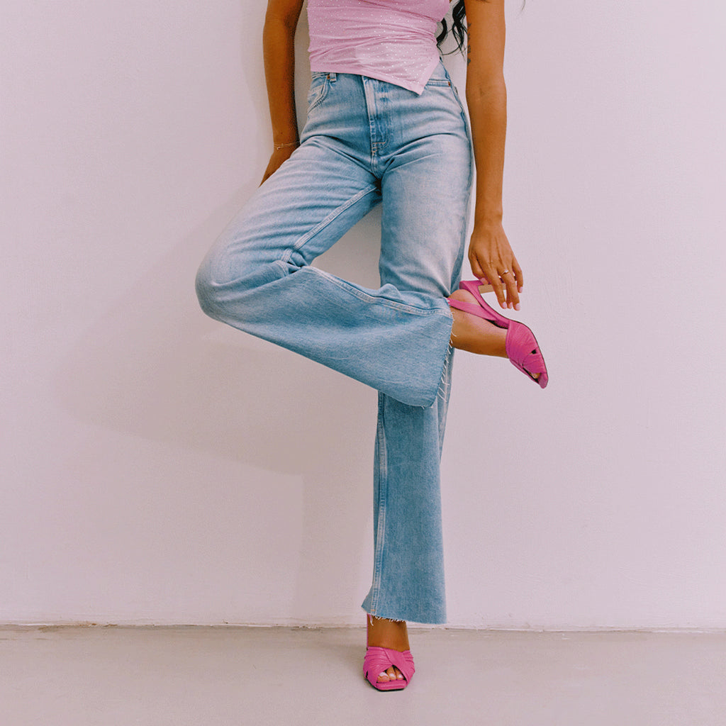 Intense pink Skyler slingback heels styled with cropped denim pants.