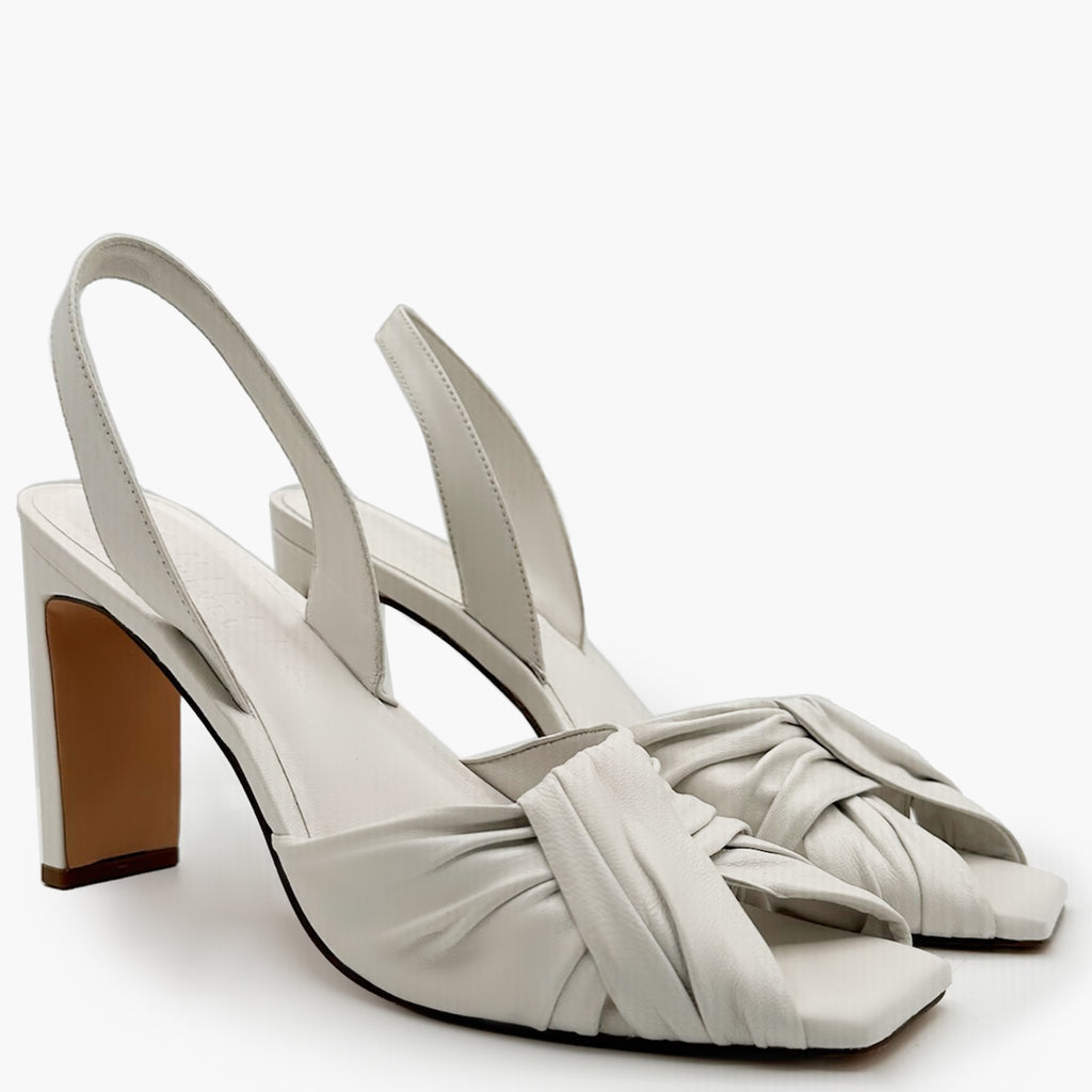 Daniella Shevel Skyler high-heel in white, studio close-up detail.