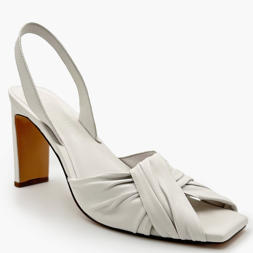 Close-up studio angle of white Skyler twisted leather strap.