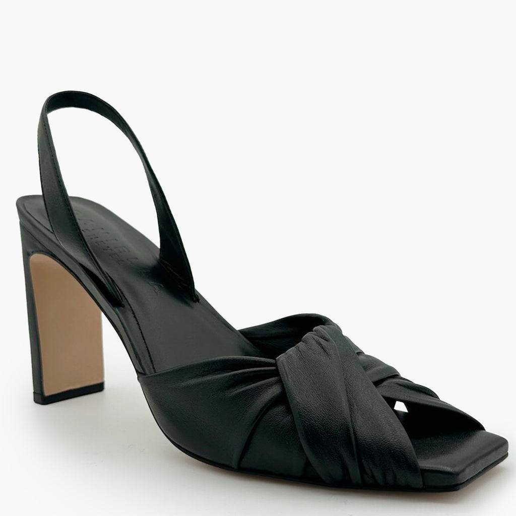 Studio shot of Daniella Shevel Skyler black slingback, angled perspective.