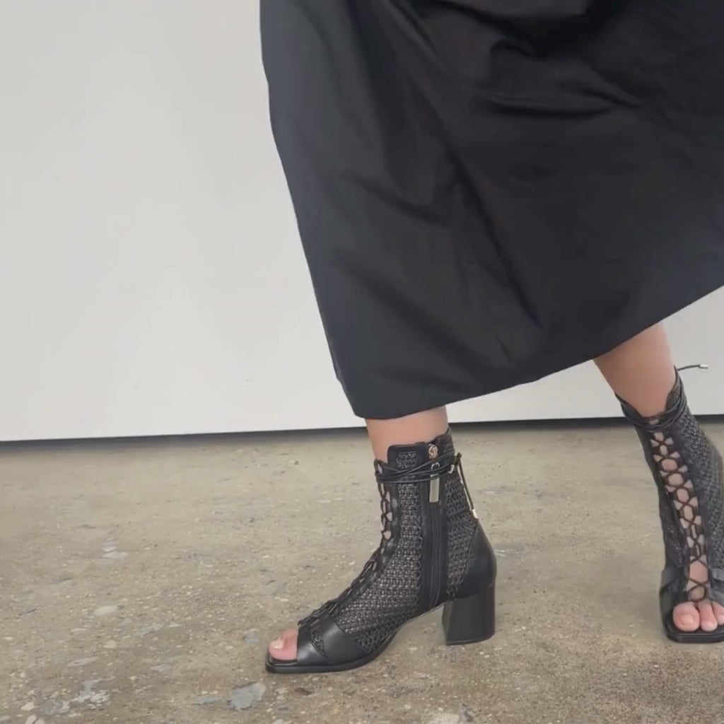 Daniella Shevel Frida lace up raffia bootie styled in a Midi dress 