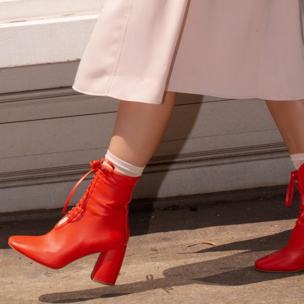 Daniella Shevel BellaDonna Red Leather Designer Boot with Heel and Red Laces on Influencers Walking in Streetstyle