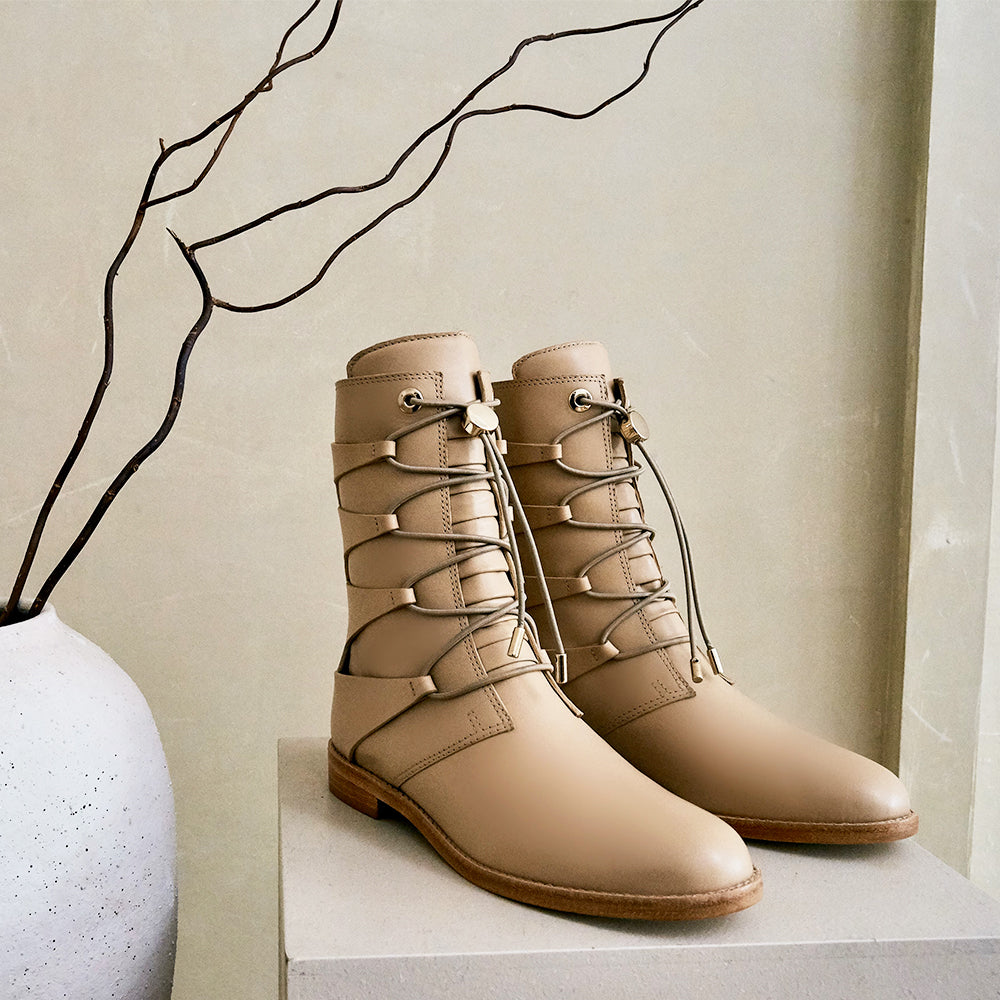 Daniella Shevel cream camel moss boots with vase