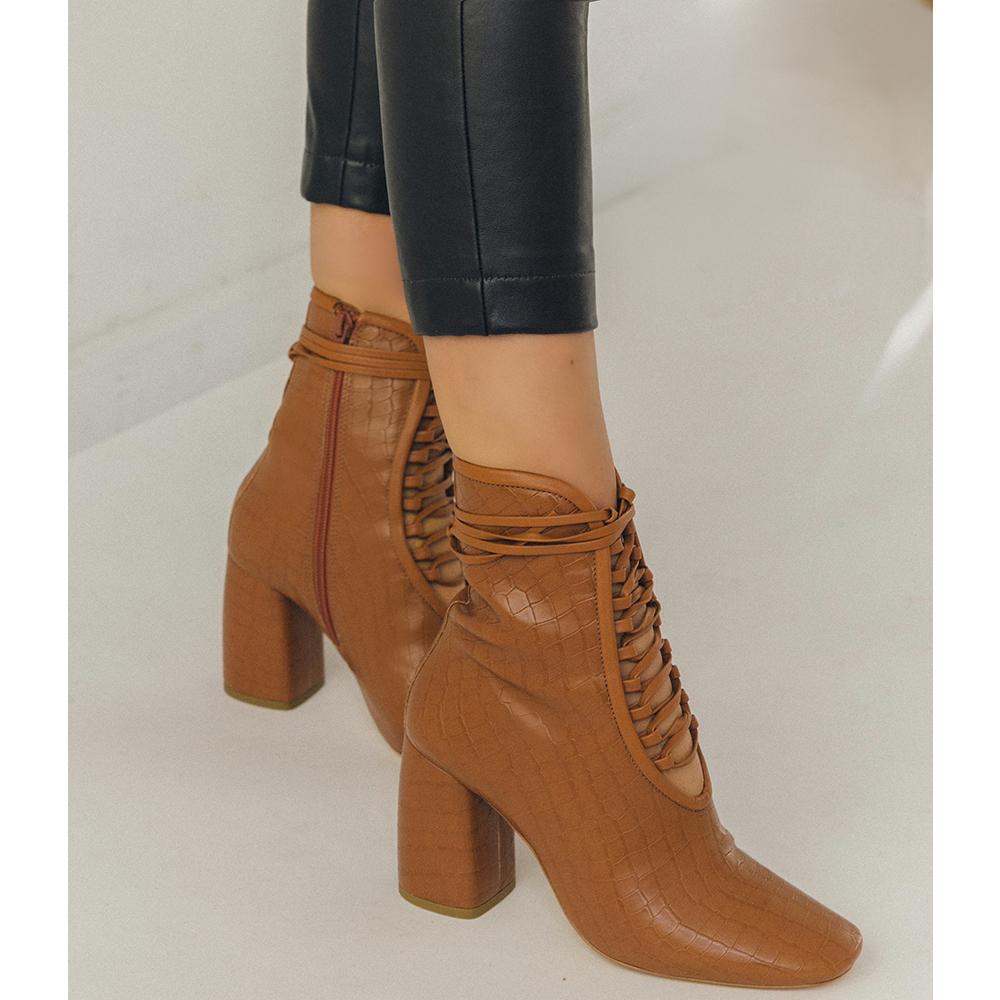Daniella Shevel BellaDonna Brown Vegan Leather Boot with Heel and vegan pant close up