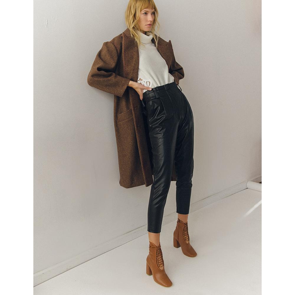 Daniella Shevel BellaDonna Brown Vegan Leather Boot with Heel on model with brown coat