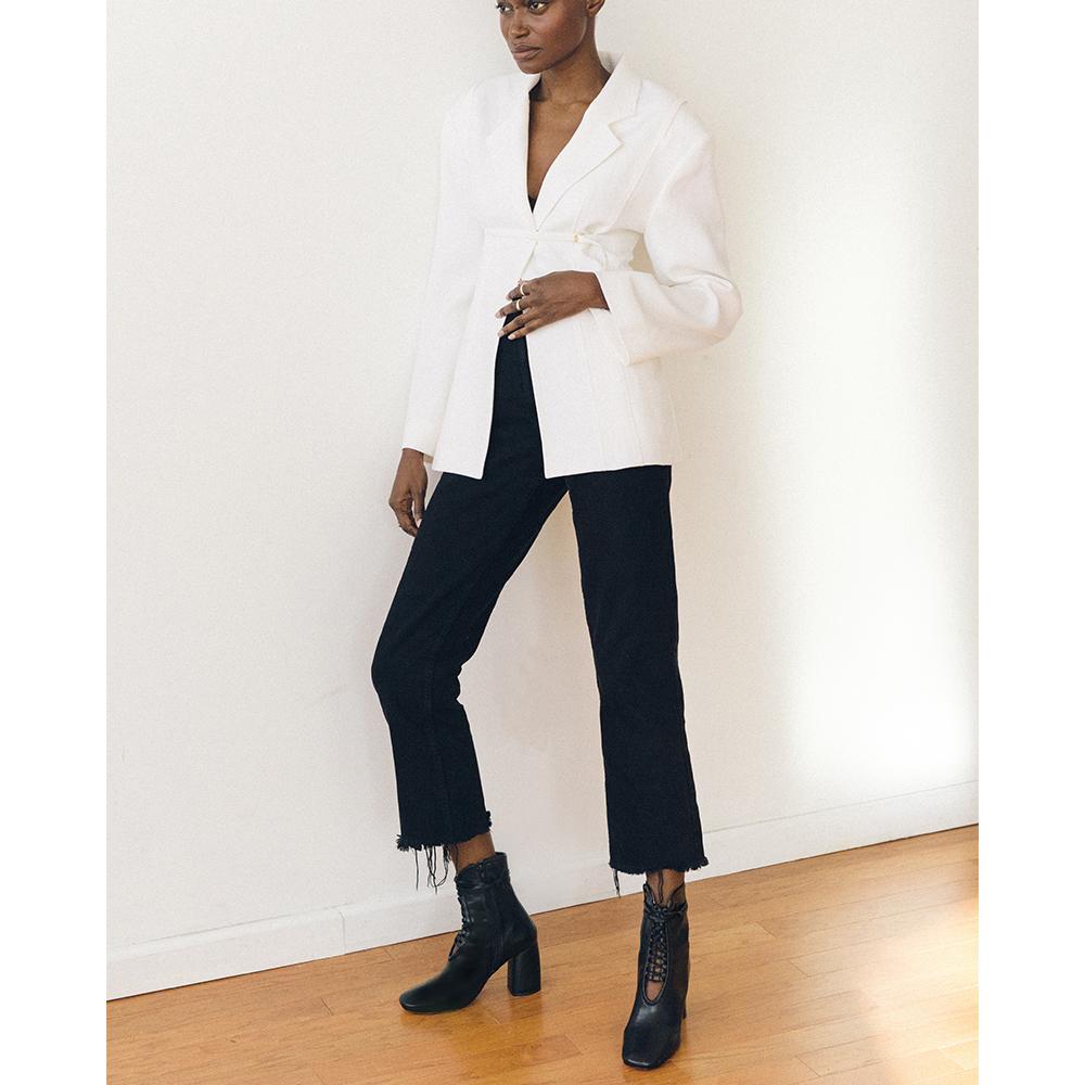 Daniella Shevel BellaDonna Black Leather Boot with Heel and Black Laces on Woman with black jeans